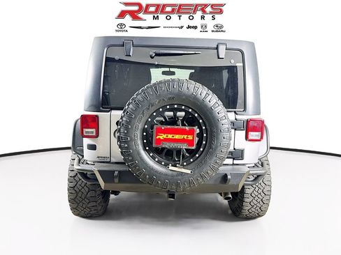 Used 2013 Jeep Wrangler Unlimited Sahara w/ Dual Top Group AWD/4WD image 7
