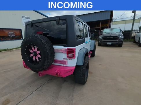 Used 2015 Jeep Wrangler Unlimited Rubicon w/ Connectivity Group AWD/4WD image 2