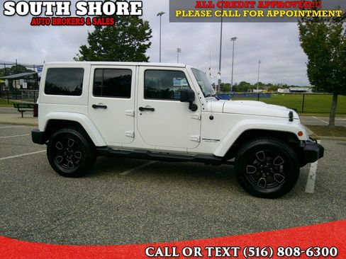 Used 2018 Jeep Wrangler Unlimited Sahara AWD/4WD image 1