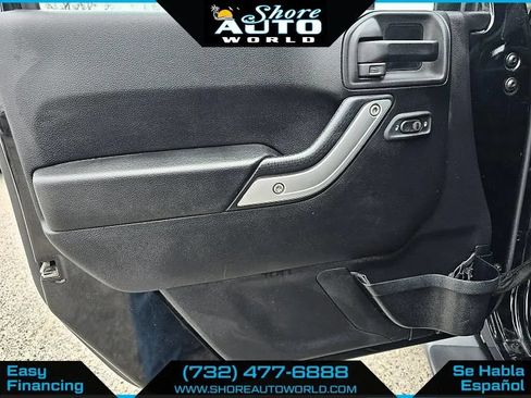 Used 2014 Jeep Wrangler Unlimited Sahara w/ Dual Top Group AWD/4WD image 11