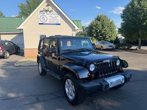 Used 2012 Jeep Wrangler Unlimited Sahara w/ Connectivity Group AWD/4WD image 1