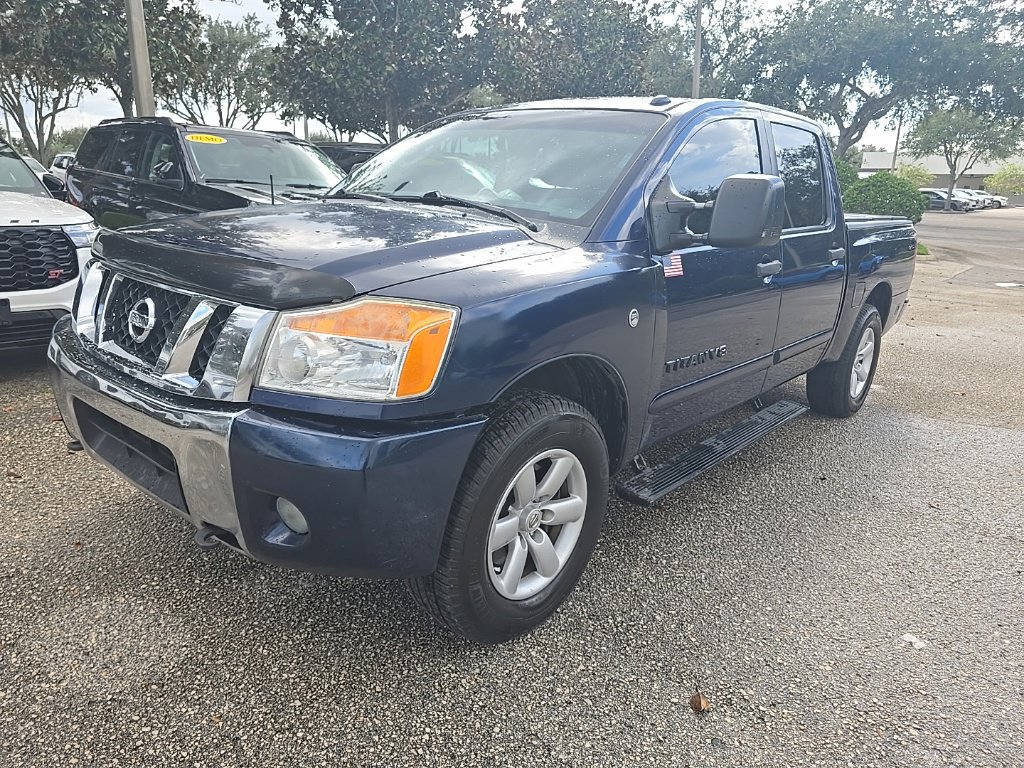 Used 2011 Nissan Titan SV w/ SV Premium Utility Pkg AWD/4WD image 1