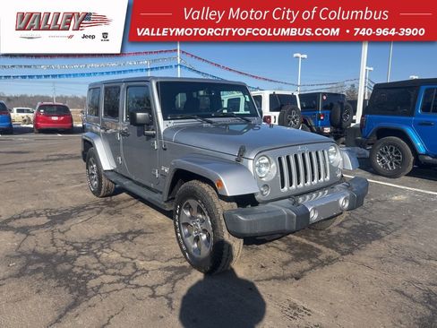 Used 2016 Jeep Wrangler Unlimited Sahara image 1
