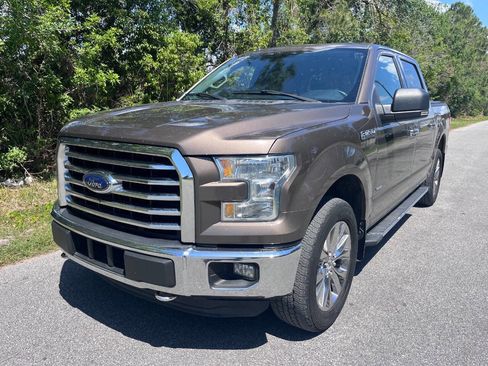 Used 2015 Ford F150 XLT w/ Equipment Group 302A Luxury AWD/4WD image 1