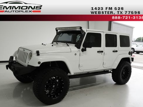 Used 2014 Jeep Wrangler Unlimited Sahara w/ Max Tow Package image 1