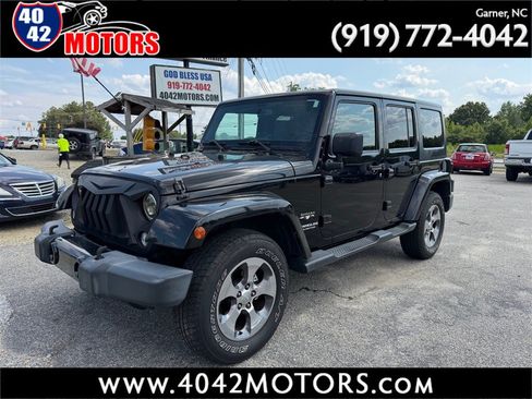Used 2016 Jeep Wrangler Unlimited Sahara w/ Connectivity Group AWD/4WD image 1