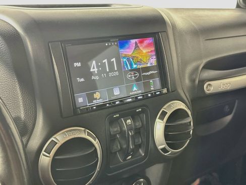 Used 2013 Jeep Wrangler Unlimited Sahara w/ Dual Top Group AWD/4WD image 15