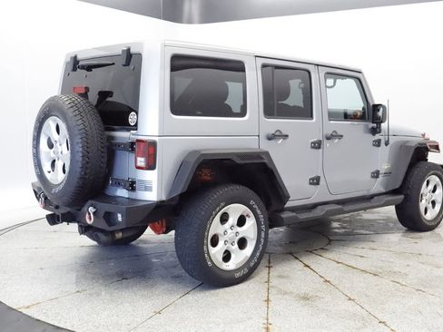 Used 2013 Jeep Wrangler Unlimited Sahara w/ Dual Top Group AWD/4WD image 6