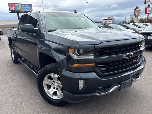 Used 2017 Chevrolet Silverado 1500 LT w/ Texas Edition AWD/4WD image 1