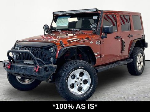 Used 2014 Jeep Wrangler Unlimited Sahara w/ Dual Top Group AWD/4WD image 1