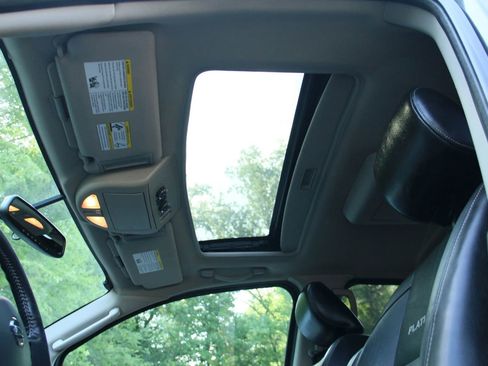Used 2011 Nissan Armada Platinum w/ 2nd Row Captain Seat Pkg AWD/4WD image 11