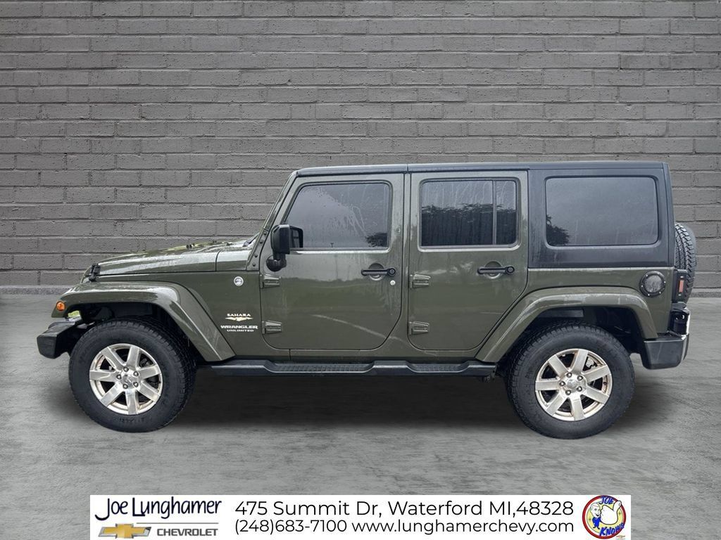 Used 2015 Jeep Wrangler Unlimited Sahara w/ Dual Top Group AWD/4WD image 7