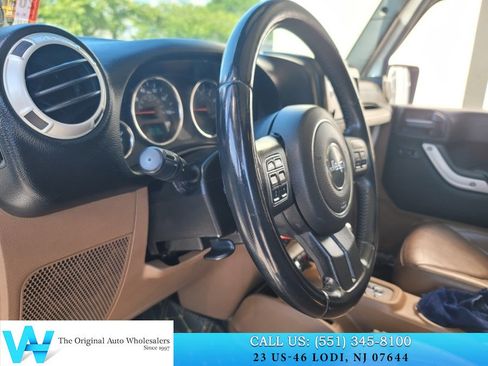 Used 2014 Jeep Wrangler Unlimited Sahara w/ Dual Top Group AWD/4WD image 15