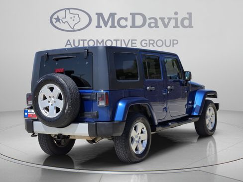 Used 2010 Jeep Wrangler Unlimited Sahara w/ Dual Top Group AWD/4WD image 6