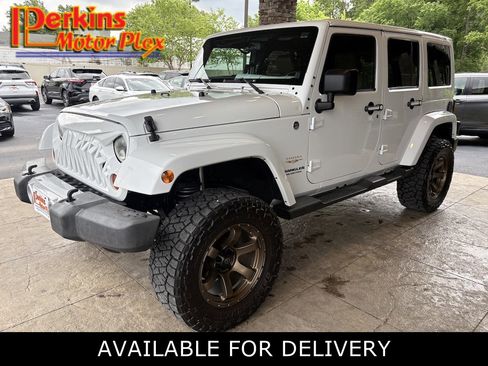 Used 2013 Jeep Wrangler Unlimited Sahara w/ Connectivity Group AWD/4WD image 1