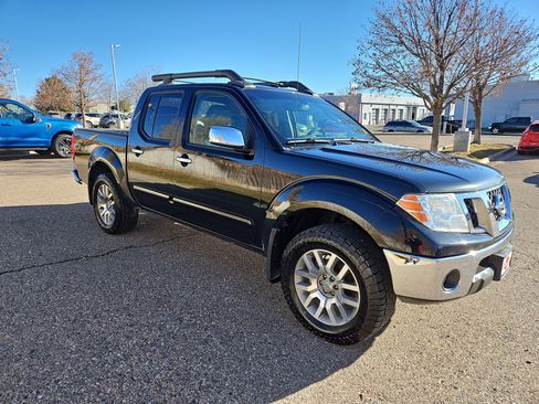 Used 2011 Nissan Frontier SL image 2