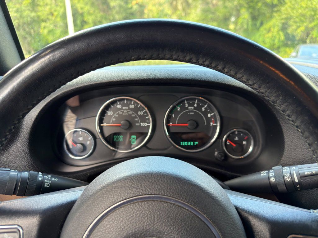 Used 2015 Jeep Wrangler Unlimited Sahara w/ Dual Top Group AWD/4WD image 17
