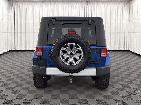 Used 2010 Jeep Wrangler Unlimited Sahara w/ Dual Top Group AWD/4WD image 4