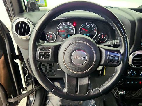 Used 2012 Jeep Wrangler Unlimited Sahara w/ Dual Top Group AWD/4WD image 14