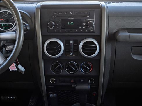 Used 2009 Jeep Wrangler Unlimited Sahara w/ Dual Top Group image 17