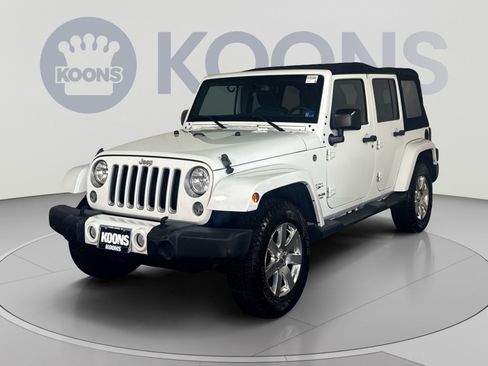 Used 2016 Jeep Wrangler Unlimited Sahara w/ Dual Top Group AWD/4WD image 1