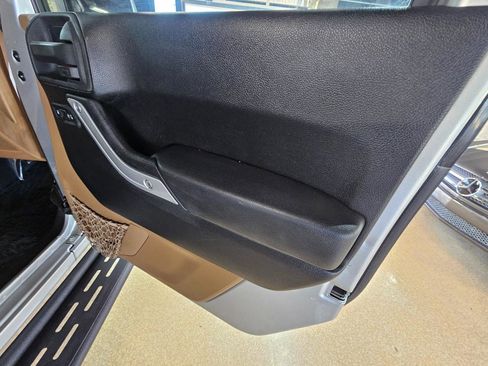 Used 2012 Jeep Wrangler Unlimited Sahara w/ Dual Top Group AWD/4WD image 9