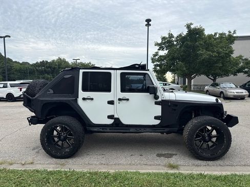 Used 2012 Jeep Wrangler Unlimited Sahara w/ Dual Top Group AWD/4WD image 4