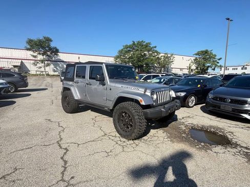 Used 2014 Jeep Wrangler Unlimited Rubicon w/ Dual Top Group AWD/4WD image 1