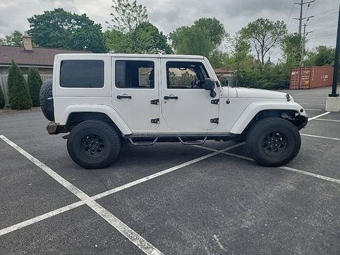 Used 2012 Jeep Wrangler Unlimited Sahara w/ Dual Top Group AWD/4WD image 7