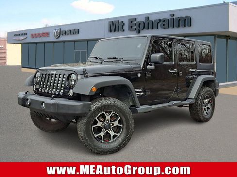 Used 2012 Jeep Wrangler Unlimited Sport image 1
