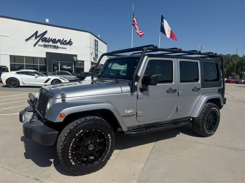Used 2014 Jeep Wrangler Unlimited Sahara AWD/4WD image 1