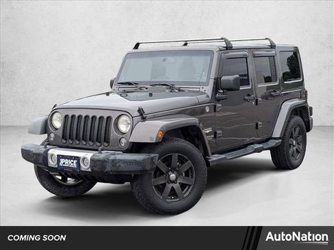 Used 2014 Jeep Wrangler Unlimited Sahara w/ Max Tow Package AWD/4WD image 1