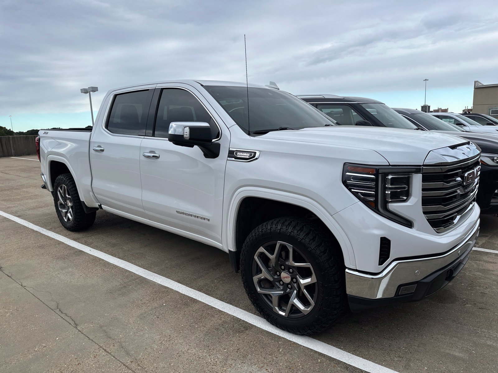 Used 2024 GMC Sierra 1500 SLT AWD/4WD image 1