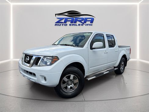 Used 2012 Nissan Frontier PRO-4X AWD/4WD image 1