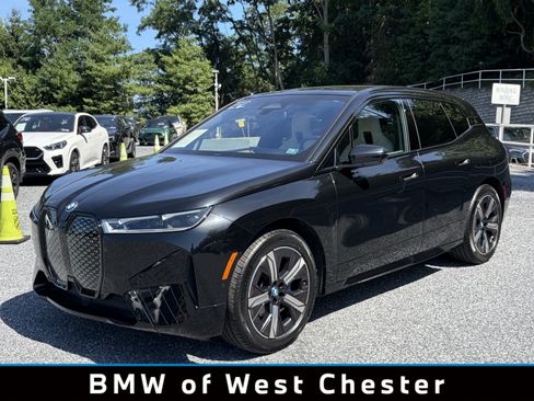 Used 2024 BMW iX xDrive50 w/ Premium Package AWD/4WD image 1
