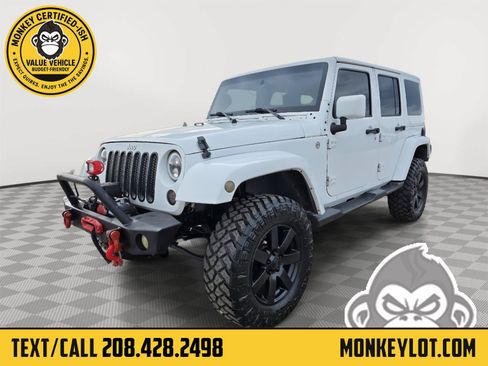 Used 2013 Jeep Wrangler Unlimited Sahara w/ Connectivity Group AWD/4WD image 1