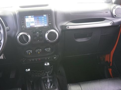 Used 2012 Jeep Wrangler Unlimited Sahara w/ Dual Top Group AWD/4WD image 25
