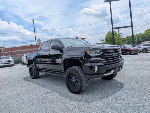 Used 2017 Chevrolet Silverado 1500 LTZ Z71 w/ Realtree Edition AWD/4WD image 3