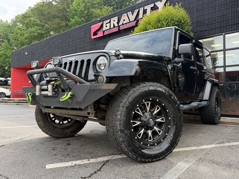Used 2013 Jeep Wrangler Unlimited Sahara w/ Connectivity Group AWD/4WD image 2