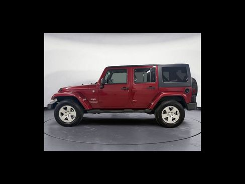 Used 2012 Jeep Wrangler Unlimited Sahara w/ Dual Top Group AWD/4WD image 3