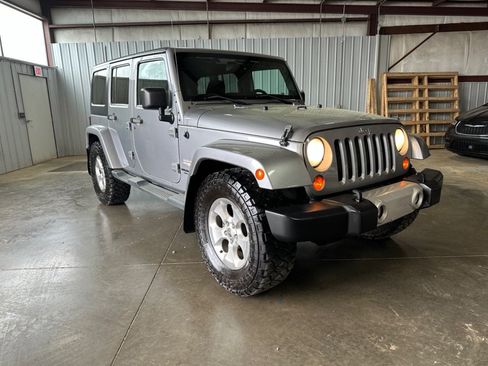Used 2013 Jeep Wrangler Unlimited Sahara w/ Trailer Tow Group AWD/4WD image 1