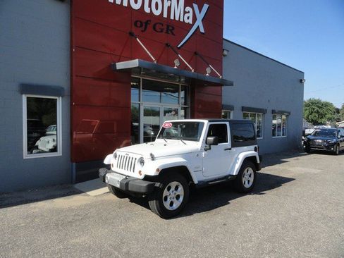 Used 2013 Jeep Wrangler Sahara w/ Dual Top Group AWD/4WD image 1