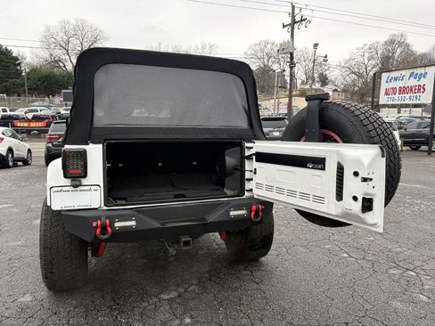 Used 2014 Jeep Wrangler Unlimited Sahara w/ Dual Top Group image 4