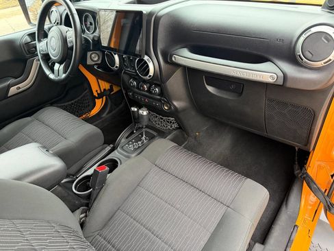 Used 2012 Jeep Wrangler Unlimited Sahara w/ Dual Top Group image 25