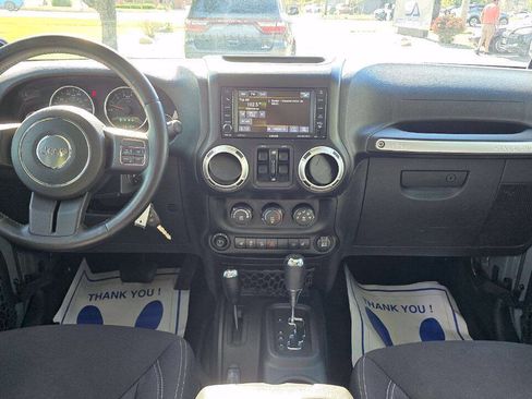 Used 2014 Jeep Wrangler Unlimited Sahara w/ Dual Top Group AWD/4WD image 15