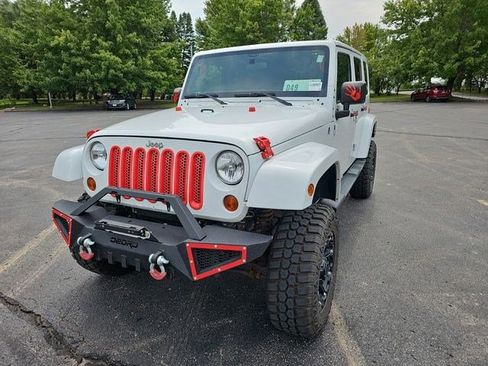 Used 2012 Jeep Wrangler Unlimited Sahara w/ Dual Top Group AWD/4WD image 2