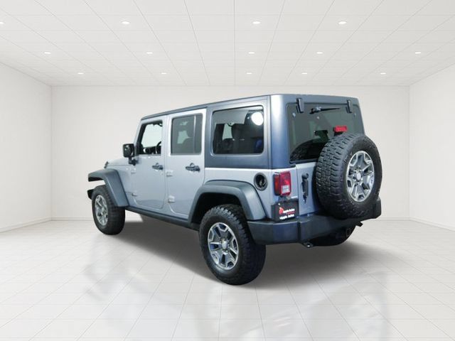 Used 2014 Jeep Wrangler Unlimited Rubicon w/ Dual Top Group AWD/4WD image 4