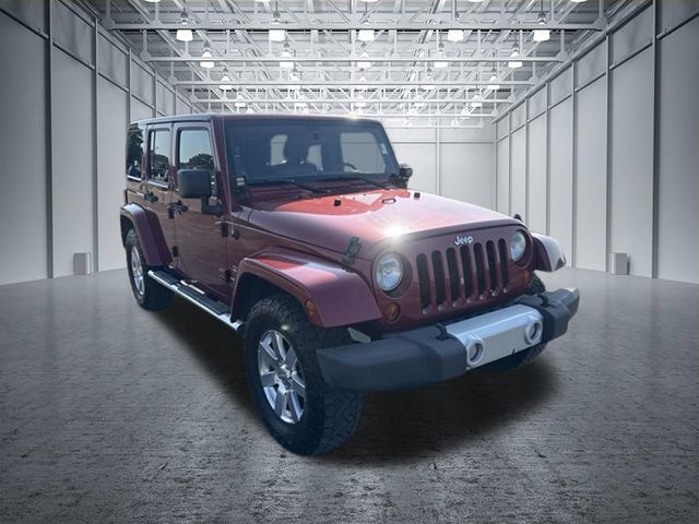 Used 2012 Jeep Wrangler Unlimited Sahara w/ Mopar Chrome Edition Group AWD/4WD image 7