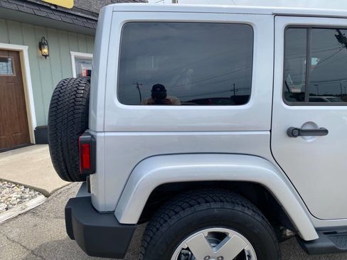 Used 2012 Jeep Wrangler Unlimited Sahara w/ Dual Top Group AWD/4WD image 62