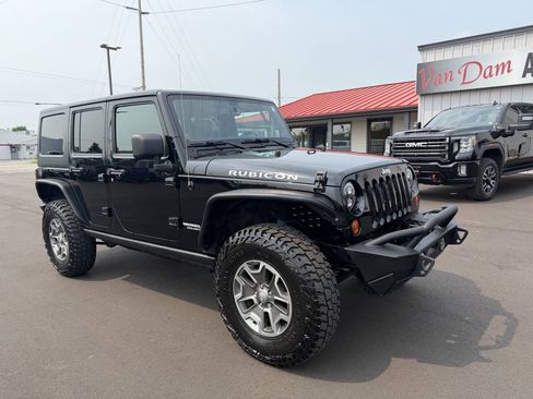 Used 2013 Jeep Wrangler Unlimited Rubicon w/ Dual Top Group AWD/4WD image 2